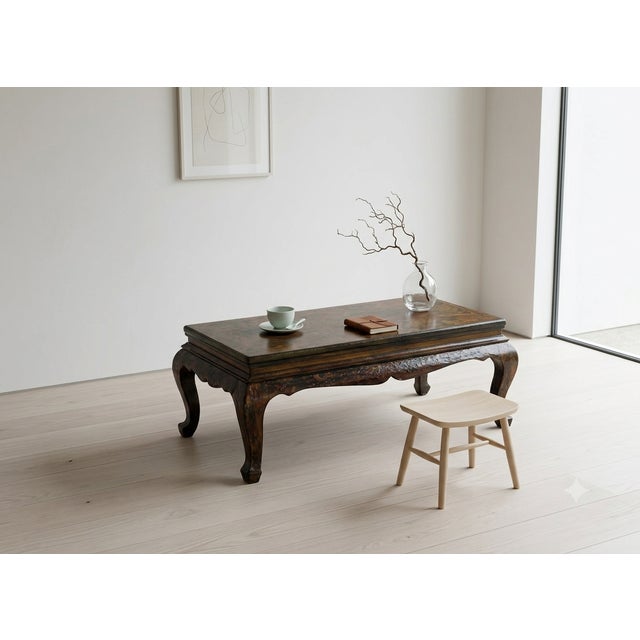 This exquisite, hand-painted Chinese lacquer coffee table brings an air of timeless sophistication and rich cultural...