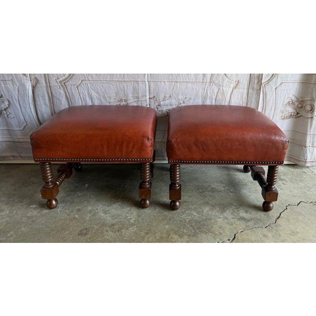 Architectural, soulful, and endlessly versatile, this handsome pair of leather benches doubles as ottomans, bringing the...