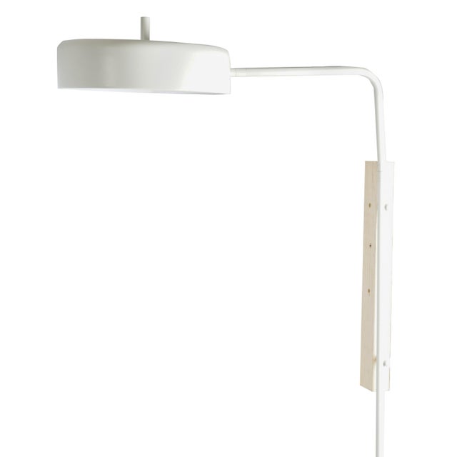 The Blu Dot Bobber LED Wall Sconce is a modern lighting fixture that combines minimalist design with functional...
