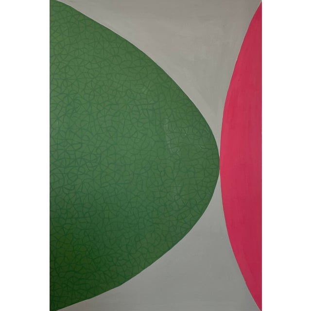This painting by Sarah Vaaler features opposing half ovals with additional squiggly detail on the green side. Background...