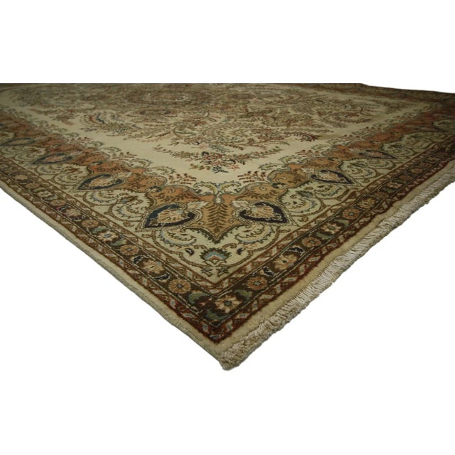 Vintage Persian Tabriz Rug with Arts and Crafts Style 09'08 X 13'03. With it's timeless elegance and well-balanced...
