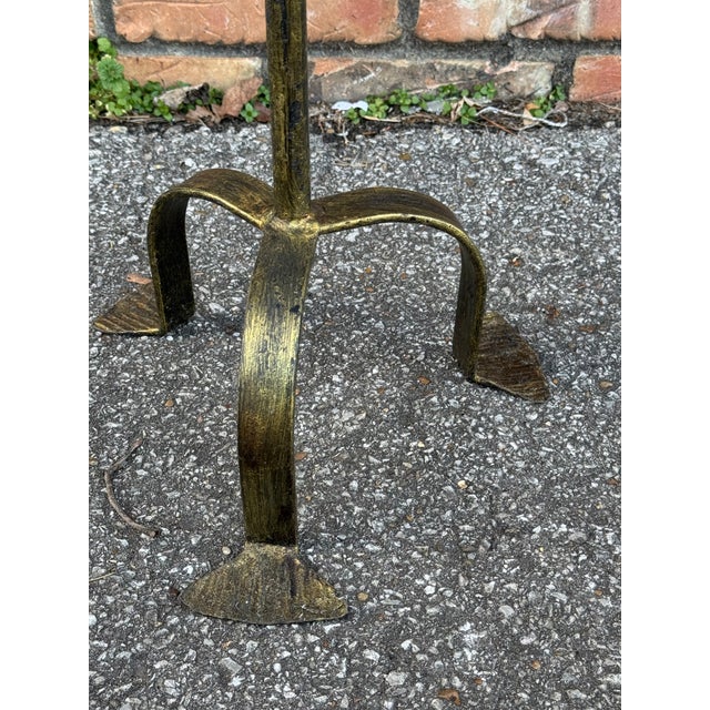 This is wonderful little Spanish made wrought iron drink table with an antiqued gold finish. It is contemporary yet...