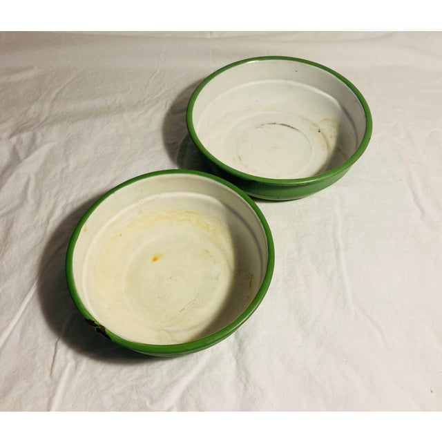 Two vintage nesting bowls of enamelware ( enamel over tin ) probably Eastern European round probably kitchen mixing bowls
