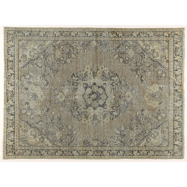 Vintage Tribal Medallion Rug in Muted Blues and Beiges – Handwoven Elegance with Architectural Symmetry This exquisite...