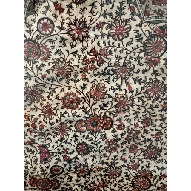 This hand‑painted silk textile features a traditional mihrab motif from Yazd, Iran, with fine brushwork and detailed...