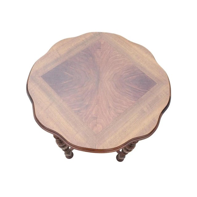 Edwardian Walnut Occasional Table with Book matched Top. Made in the 1930. Very good vintage condition. Has been...