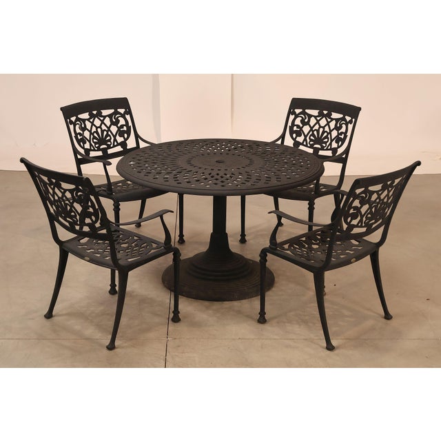 High Quality American Made Cast Aluminum Outdoor Dining Set Consisting Of A Round Pierced Top Table And Four Matching...