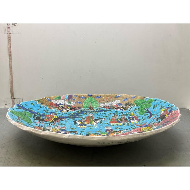 This is a huge hand-painted Kutahya ceramic charger from Turkey. It is signed on the back by the artist Elsam Akdeniz...
