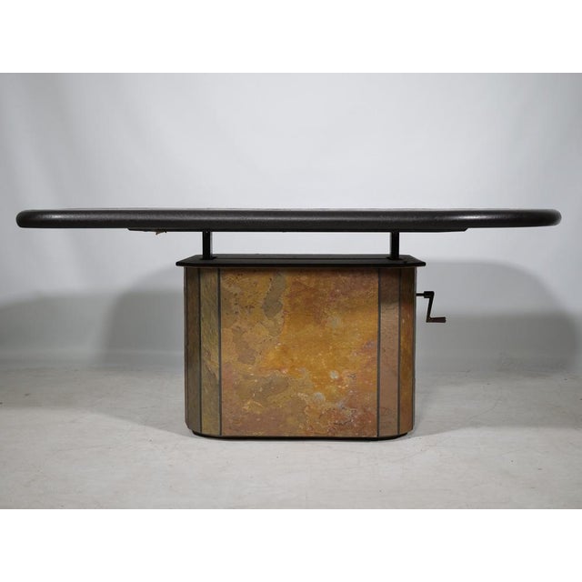 A Brutalist-style, modular coffee table designed by Dutch artist Paul Kingma in the 1970s. The artist used a variety of...