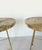 Elegant vintage coffee table or side table with a brass frame and a round marble top. Two pieces available with slightly...