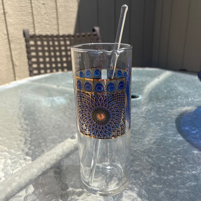 Mid Century Cocktail Pitcher and Glass Stirrer with a gorgeous peacock design.