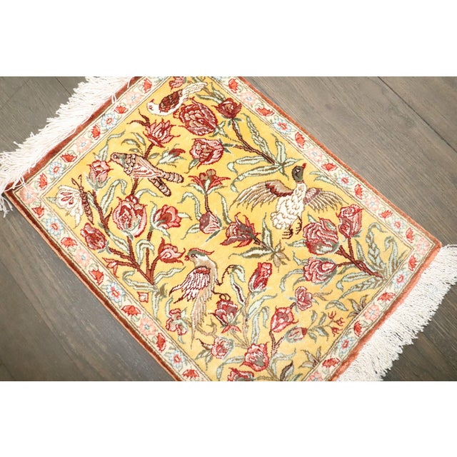 A mid 20th century Persian Part Silk Qum Mini Rug