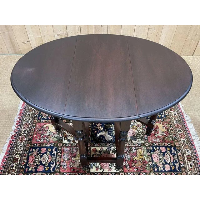 English gateleg in mahogany, work in early xxth - closed l = 76.5cm l = 38cm h = 73cm open l = 1m05 l = 76.5cm h = 73cm