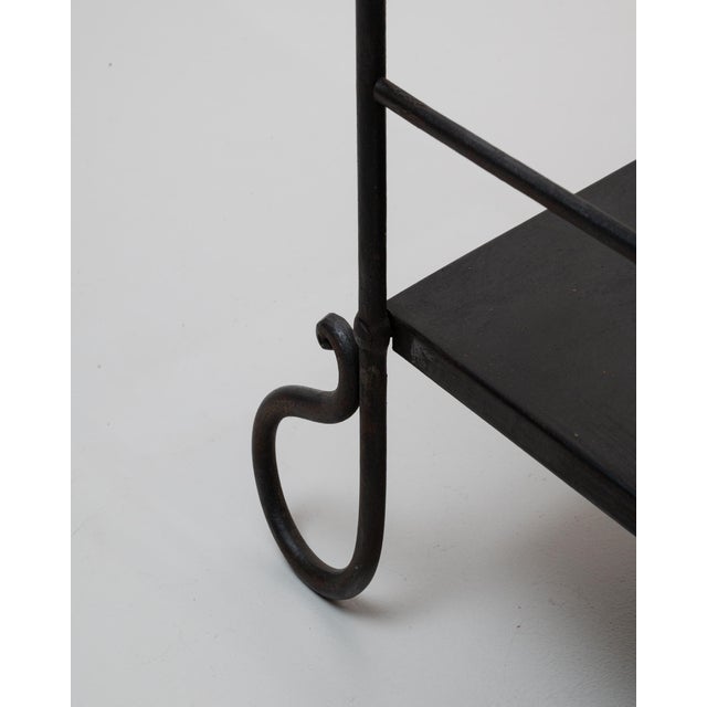 This 1900s French metal vanity combines delicate ironwork with functional elegance, showcasing the lightness and charm of...