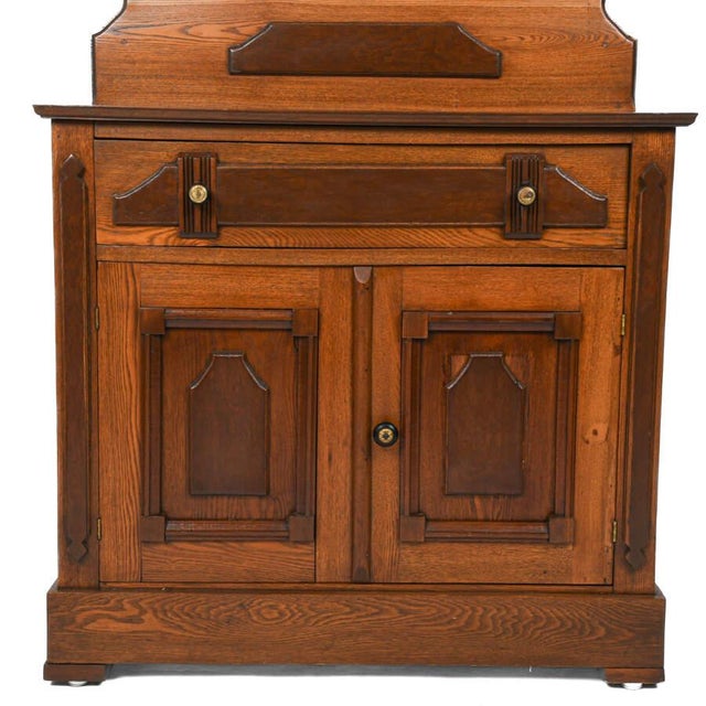 This Antique Victorian Walnut Dry Sink Washstand adds 19th-century charm to any home. Crafted from walnut, it features an...