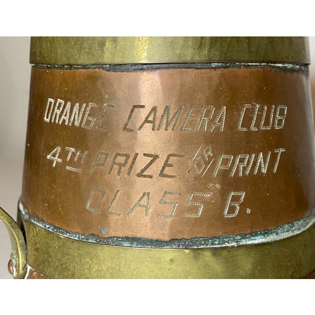 Up for sale is a rare antique Arts & Crafts brass and copper tri-handle mug camera club award. It has a russian Imperial...