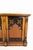 An exceptional oak side cabinet of impressive scale and character, showcasing striking Gothic-inspired craftsmanship...