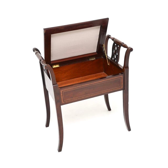 A lovely antique Edwardian inlaid piano stool. This was made in England, it dates from around 1900-1910. It is of fine...