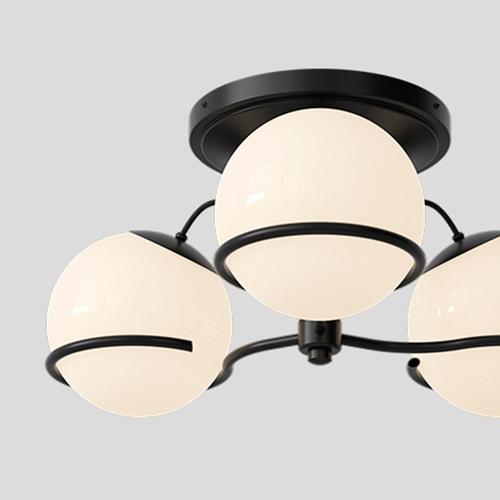 Model 2042/3 design by gino sarfatti the two blown opaline glass spheres are gently held in place by two black, or...