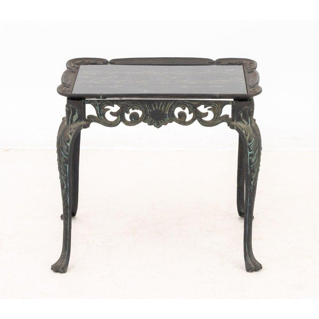 Louis XV Style Faux Marble Paint-Decorated Glass Top Cast Iron End Table, the reticulated scrolling foliate motif base...