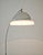 This vintage 1970s arched floor lamp, crafted from chromed brass with a two-tone shade, is a classic Space Age lighting...