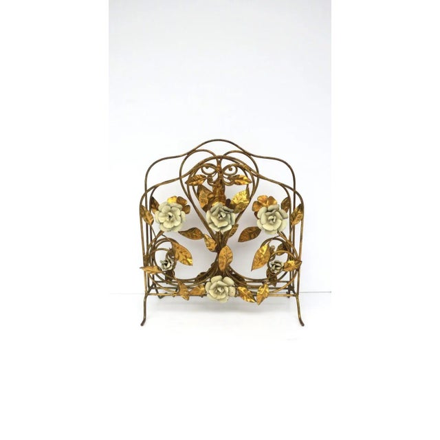 A beautiful Italian gold gilt and enamel magazine holder rack with flowers and leaves, circa mid-20th century, 1950s,...