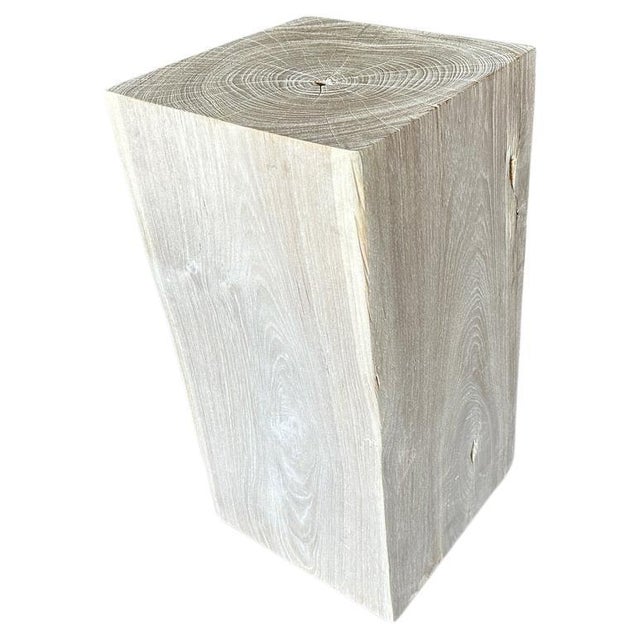 Reclaimed teak wood side table or pedestal hand carved whilst respecting the natural organic wood. Bleached to a bone...