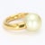 This is a nice, simple, but eye catching ring made of 18k yellow gold and a 13mm round pearl. - Stone Info - Pearl 13mm...