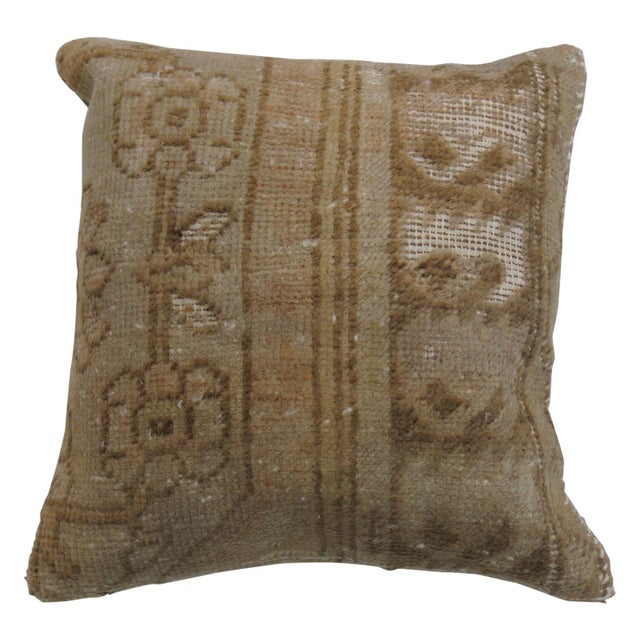 Pillow made from a Turkish Oushak rug. Tan and brown accents. Measures: 15" x 16''