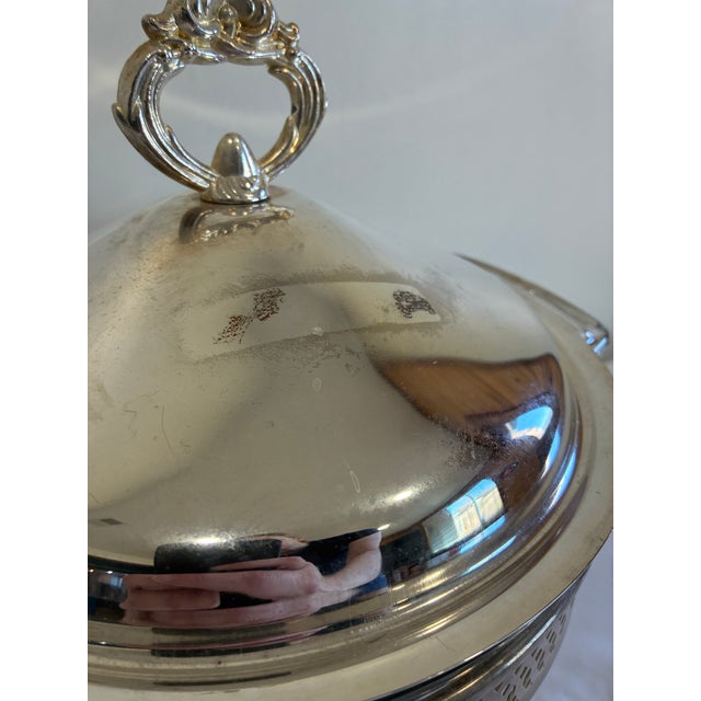 Vintage Anchor Hocking chafing dish with original glass insert and silver-plated warming stand. This classic buffet server...