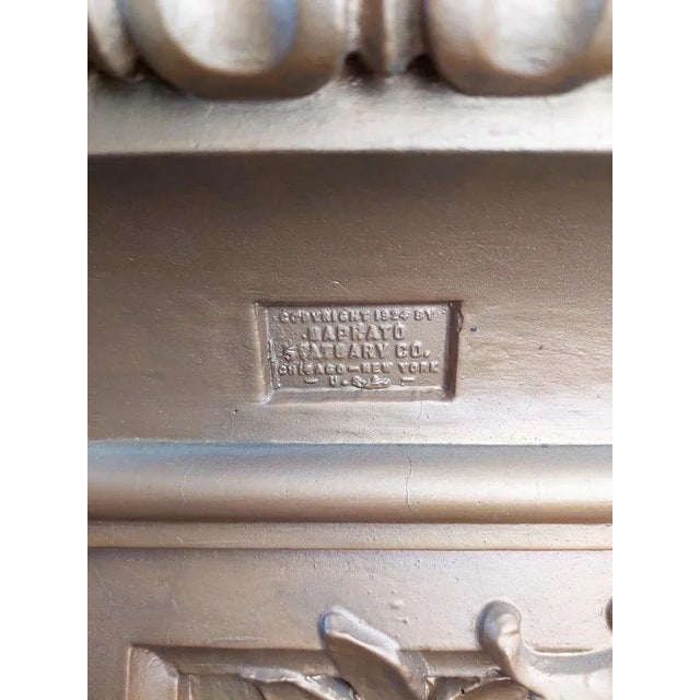 Pair of (almost) antique gold patinated wooden pedestals. On four sides with gesso decorations such as a cartouche,...