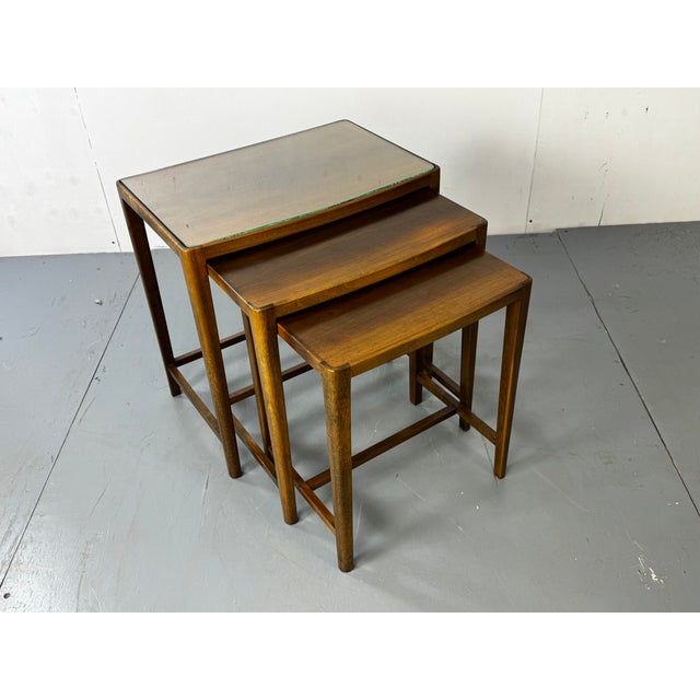 Vntage Danish Mid Century Modernist Set off nesting tables, 1960s Well made set. The largest table has a glass top. The...