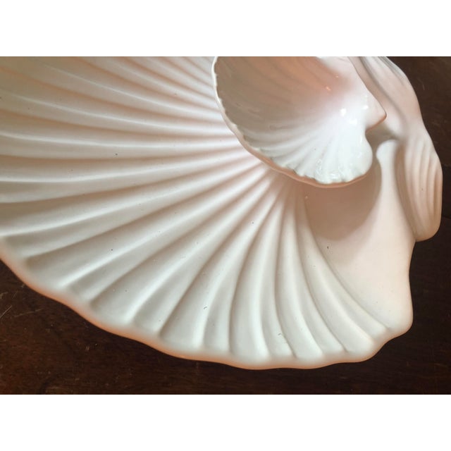 This fabulous large 1990s Portugal Clam Shell Platter With Attached Dip Bowl will be a hit at your next social gathering....