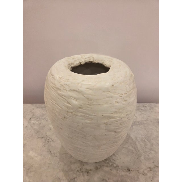 Large and tall textured vase, egg-shell plaster with inverted opening