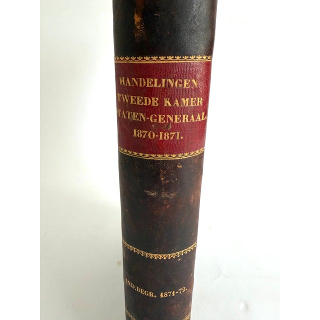 This 1871 Dutch leather bound book with a beautiful marbleized cover translates to "Proceedings of the States General...