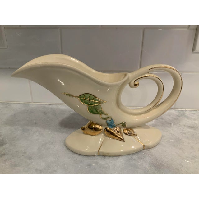 Hull pottery cornucopia. Beautiful pink and blue flowers with green leaves and gold. Made in Ohio.