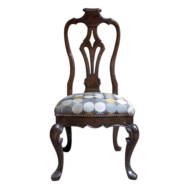 Featuring a Fremarc Designs carved slat back side chair. Shown in an Antique Brittany finish.
