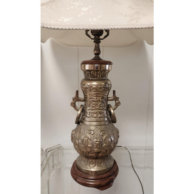 pair of gorgeous solid brass table lamps with pagoda shades, in the manner of James Mont, ornate Asian styling from the...