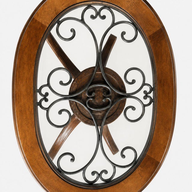 This beautiful oval coffee table combines timeless design with sturdy craftsmanship. The table features a beveled glass...