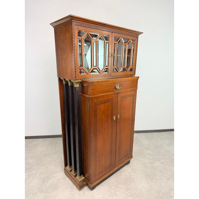 A prime document of early Viennese Modernism, this two-tier salon cabinet demonstrates the tectonic clarity and material...