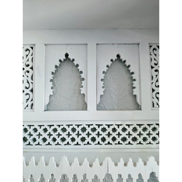 Bring a touch of Moroccan artistry to your home with this exquisite handcrafted wall shelf. Carefully made by skilled...