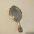 Silver Hand Mirror - 19th Century. 139 grams. Height: 9.85 in (25 cm) Width: 4.73 in (12 cm) Depth: 0.4 in (1 cm). This...