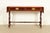 An exceptional English Regency or Georgian style drop leaf writing desk, console table, or sofa table By Baker Furniture...