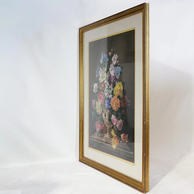 This beautiful, brightly colored vintage still life depicts a lavish bouquet of roses, irises, tulips, and various other...