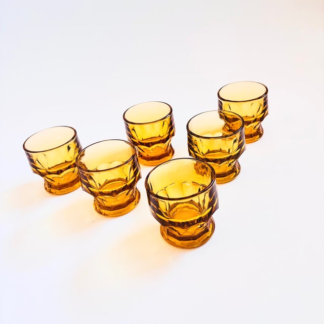 A set of 6 vintage amber cordial glasses. Made in the "Georgian" pattern. Nice faceted bases with a good heavy weight to...