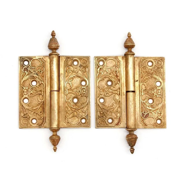 Right Victorian bronze lift off butt door hinge with steeple tips, a staggered hole pattern and two knuckles. They are in...