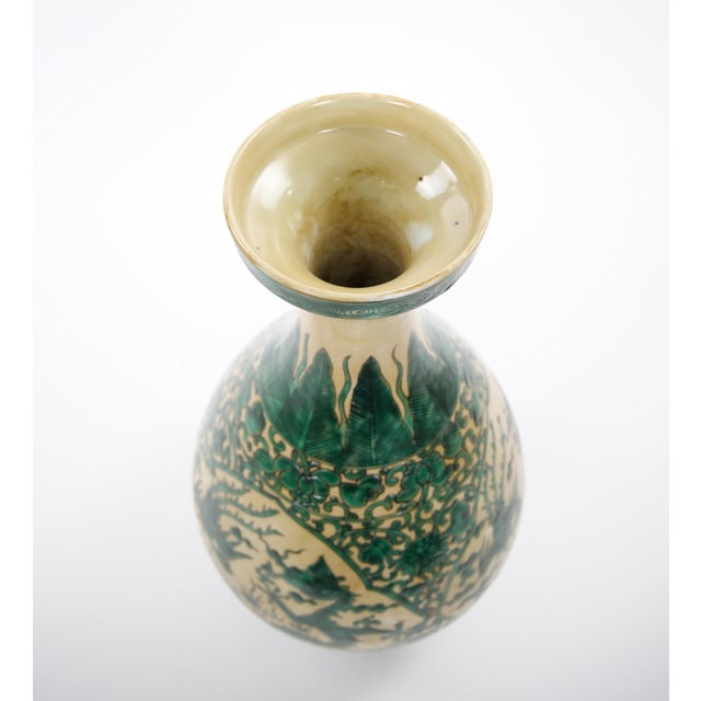 This impressive antique Asian porcelain vase features a beautifully balanced baluster form, with a wide, gently rounded...