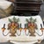 A pair of late 20th Century Spanish wall sconces. These hand-carved and painted sconces are simple yet bursting with joy...