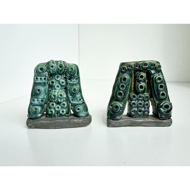 A rare and distinctive pair of ceramic bookends/paper holders or paperweights by the German painter, draftsman, and...
