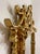 A striking vintage (circa 1970s–1980s) gilded Baroque-style wall mirror, featuring an elaborate hand-carved frame with...